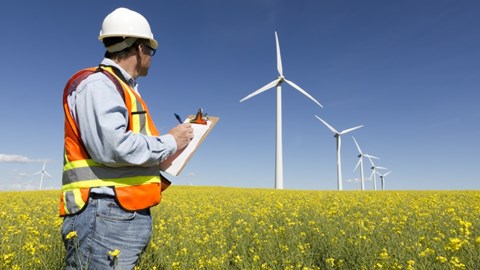 Inspector at work at wind turbines