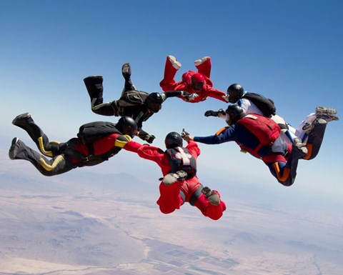 Skydivers in a circle
