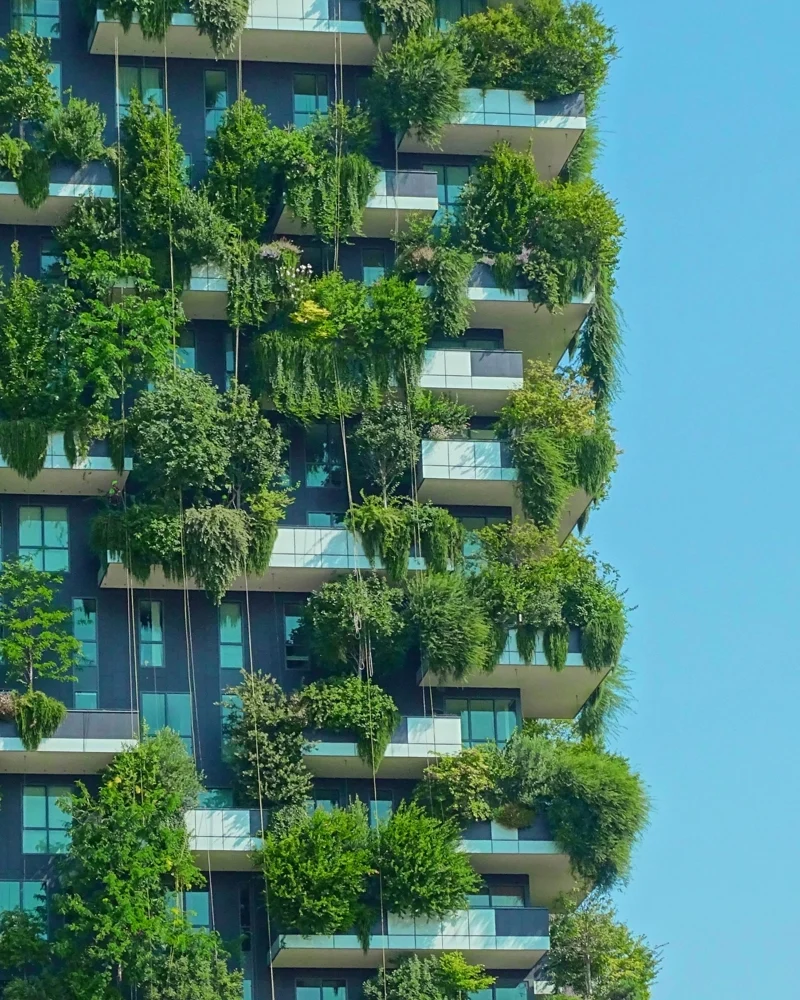 Tall building covered in greenery