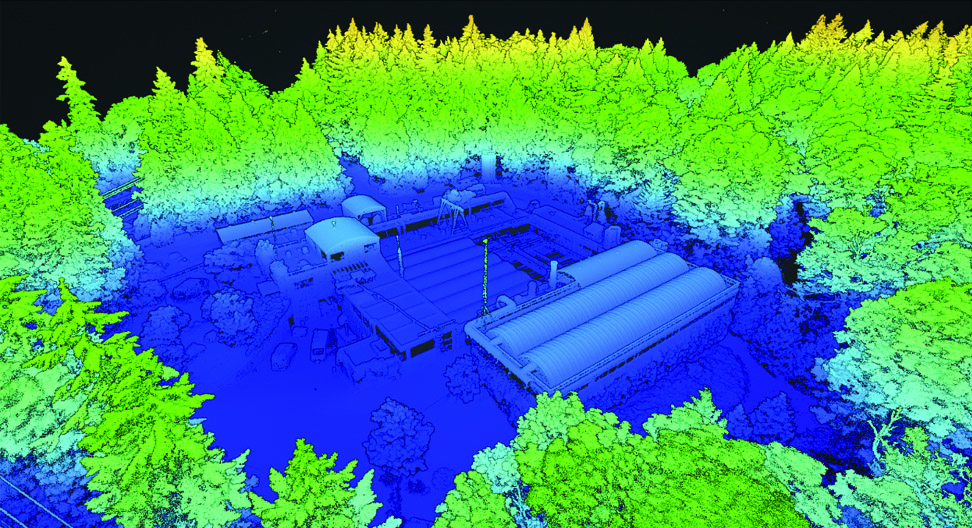 Vue aérienne en nuage de points 3D d’un complexe industriel entouré d’arbres, avec toiture et bâtiments visibles.