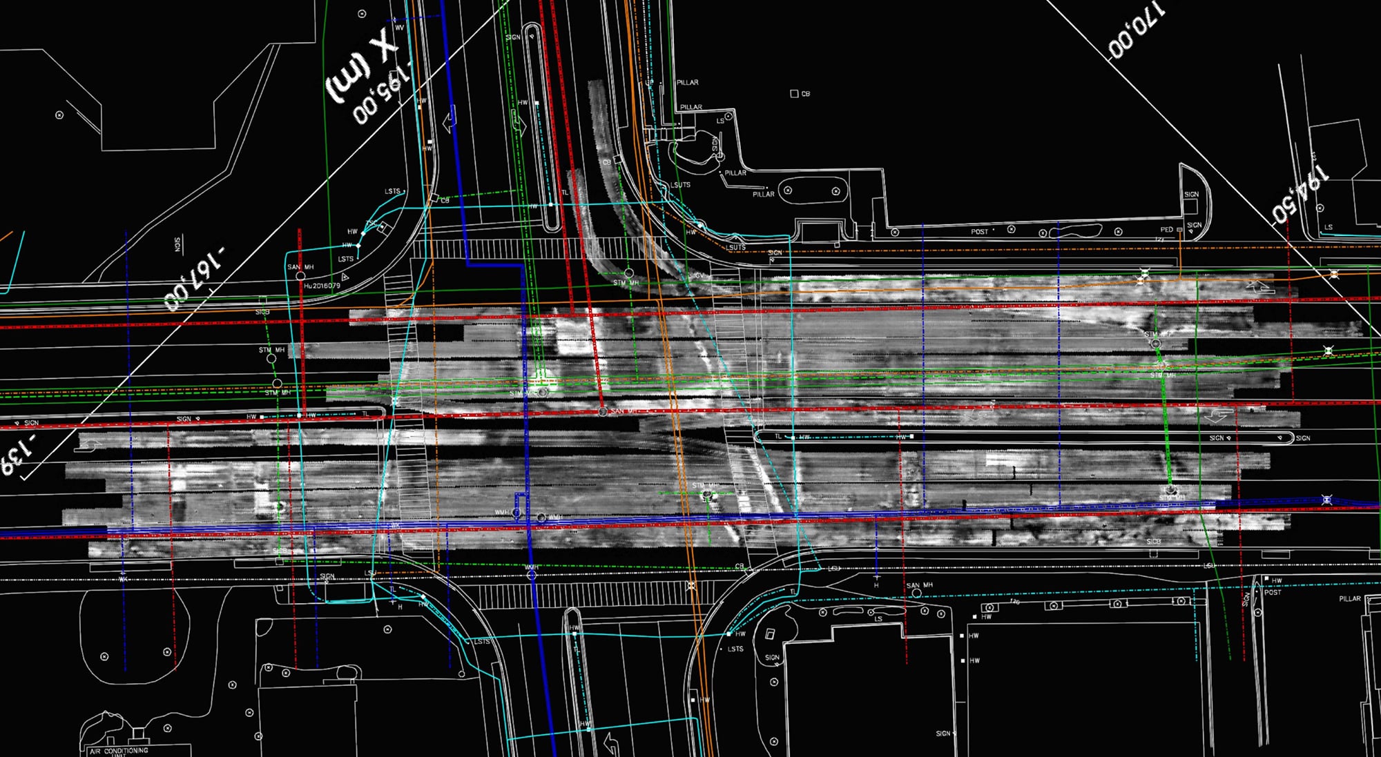 Aerial survey map of a road intersection with overlaid engineering lines, measurements, and lane markings.