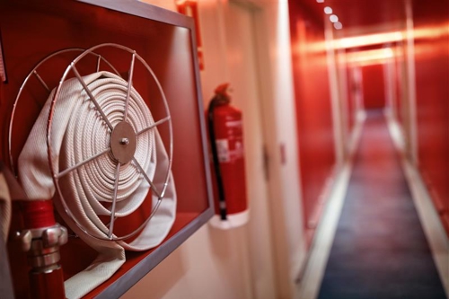 Fire safety equipment in a hallway