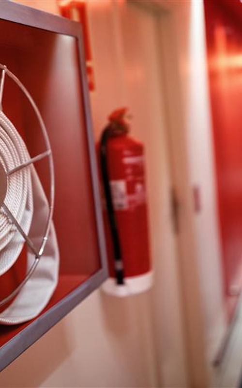 Fire safety equipment in a hallway