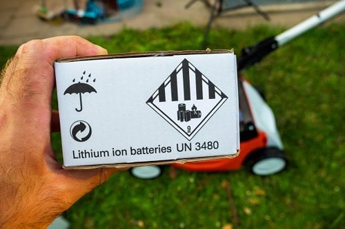A lithium-ion battery being held in a hand