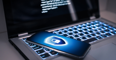 a computer with a cellphone in VPN mode